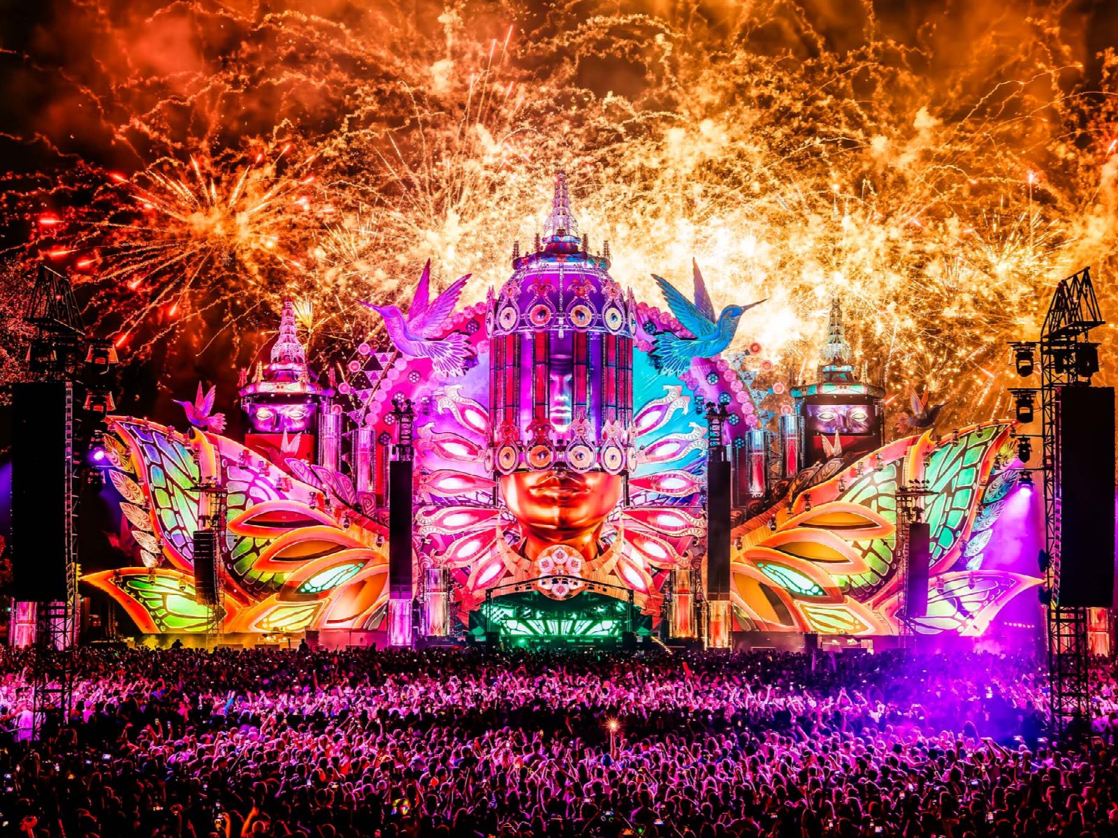 Festival crowd under lights with Superstruct name referenced in the press release