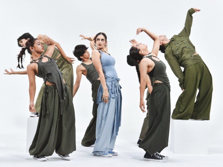 Kavya and dancers wearing Converse in the Glass Trees video